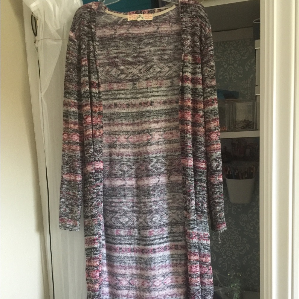 A long red and black cardigan